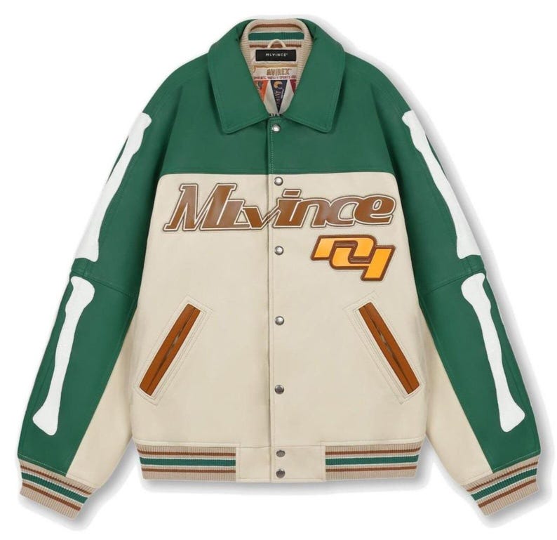 May include: A green and cream-colored varsity jacket with bone-shaped white accents on the sleeves. The jacket features the name "Mivince" in brown lettering and a number "71" patch. It has a ribbed collar, cuffs, and hem.