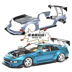 May include: A disassembled light blue car model with black accents, and a fully assembled teal car model with a large engine. The models have spoilers and custom wheels. The text "NOMI 3D" is visible.