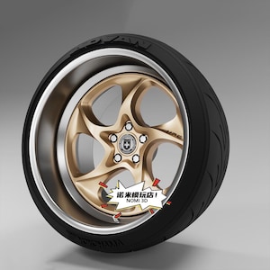 May include: A gold five-spoke wheel with a deep silver rim and a black Advan tire. The center cap features an HRE logo. A white star-shaped graphic overlay contains the text 诺米模玩店! NOMI 3D. The tire sidewall displays the Yokohama brand name.
