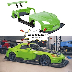 May include: A lime green sports car with black detailing, presented both assembled and as separate body components. The image includes the text "诺米模玩店! NOMI 3D". The car features black wheels and a black front bumper.