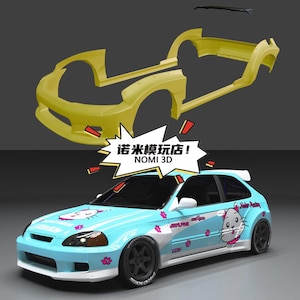May include: A light blue car with a white spoiler and black wheels. The car features a cartoon cat graphic and the text "NOMI 3D". Above the car are yellow car body parts.