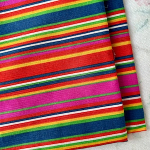 BTY - 1980&#39;s Textured Rainbow Stripe Fabric