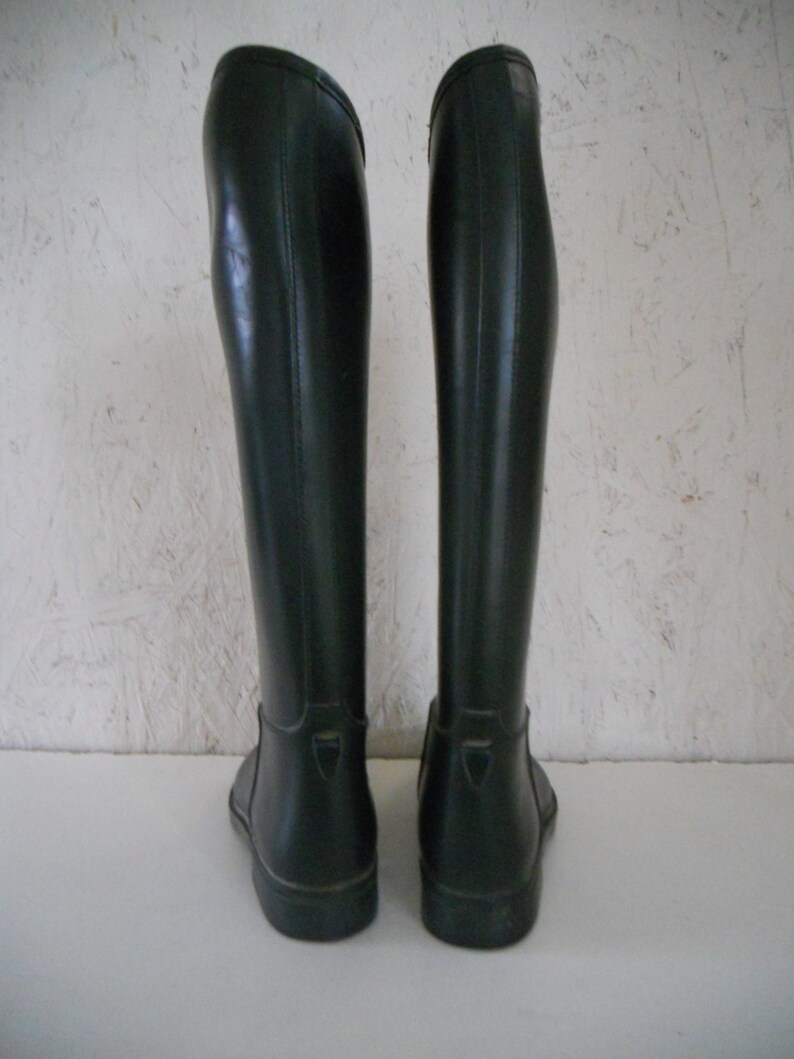 women in rubber riding boots