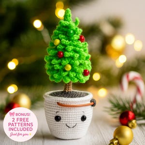 May include: A handmade crochet Christmas tree with red and yellow ornaments sits in a white pot with a smiling face. The tree has a brown trunk and is surrounded by Christmas decorations. The text "BONUS! 2 FREE PATTERNS INCLUDED Just for you" is also visible.