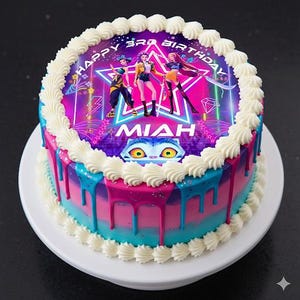 May include: A round cake with white frosting borders, featuring a colourful edible topper with the text Happy 3rd Birthday and Miah. The sides are decorated with pink and blue ombre frosting and matching drips, topped with a graphic of three characters.