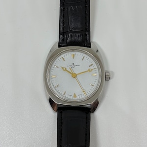 Vintage Ulysse Nardin 17 Jewels Handaufzug Swiss Made Herrenarmbanduhr mit weißem Zifferblatt Bild 7
