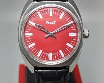 Orologio da uomo vintage Piaget con quadrante rosso, prodotto in Svizzera