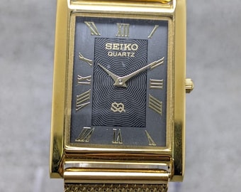 Orologio da polso giapponese vintage Seiko Quartz Tank Slim Unisex Rettangolare Ricondizionato con Quadrante Oro