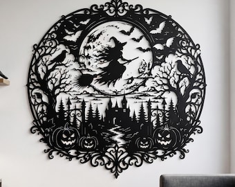 May include: A circular black wall art piece featuring a detailed laser-cut silhouette of a witch flying on a broomstick in front of a full moon, surrounded by bats, bare trees, ravens, a castle, and several jack-o'-lanterns with carved faces.