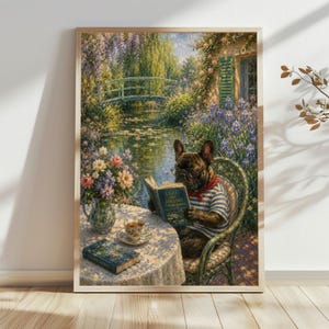 May include: A framed wall art print depicting a French Bulldog wearing glasses and a blue and white striped shirt, sitting at a round table reading a book titled L'Art des Jardins. The scene features a garden, a pond, and a bridge.