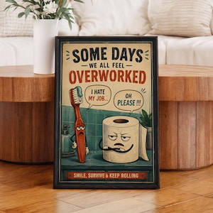 Pode incluir: Um cartaz emoldurado com uma escova de dentes e um rolo de papel higiénico de desenho animado com rostos. O texto diz: SOME DAYS WE ALL FEEL OVERWORKED, I HATE MY JOB, OH PLEASE, e SMILE, SURVIVE & KEEP ROLLING. O fundo mostra uma parede de azulejos azul-esverdeada.