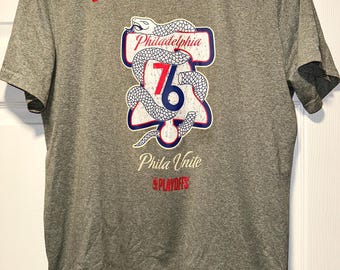 Camiseta de los Philadelphia 76ers "Phila Unite"