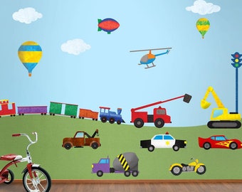 May include: A blue banner with the name "Mason" on it, a yellow airplane, a red and blue hot air balloon, a red fire truck, a yellow construction vehicle, a blue police car, a yellow motorcycle, a purple cement truck, a red sports car, a blue helicopter, a green and yellow hot air balloon, a red and blue blimp, a green airplane, a yellow train, a blue and white traffic light, and two white clouds on a blue background.