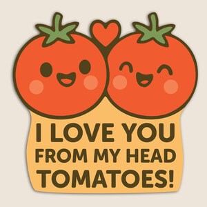 Peut inclure: Une carte mignonne avec deux tomates de dessin animé rouges avec des visages heureux et un cœur entre eux. La carte dit "Je t'aime de mes tomates de tête !"