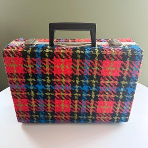 May include: A rustic wooden sign with the text "Welcome to our home" in white lettering. The sign features a distressed finish and a simple, inviting design, perfect for a front porch or entryway.