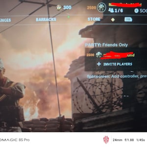 May include: A screenshot from a video game featuring a soldier aiming a weapon. The game interface displays options like "Challenges," "Barracks," and "Store." The text "PARTY: Friends Only" is visible, along with "Invite Players."