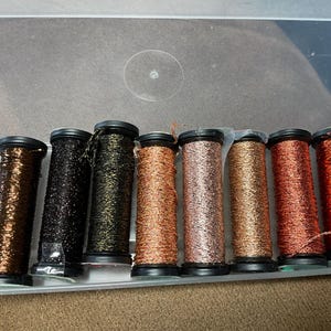 May include: A rustic wooden sign with the text "Welcome to our home" in white lettering. The sign features a distressed finish and a simple, inviting design, perfect for entryway decor.