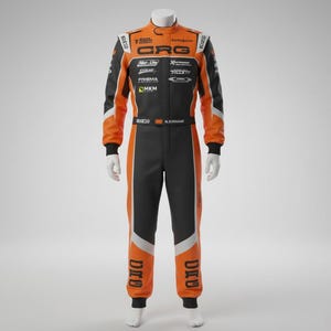 May include: Orange and black racing suit with white accents, displayed on a mannequin. The suit features the "CRG" logo and other sponsor logos. The suit has a black collar and cuffs, with the name "N. SURNAME" printed on the belt.