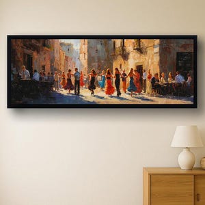 Puede incluir: Pintura enmarcada que representa una animada escena callejera con bailarines con vestidos coloridos. La obra captura un día soleado con tonos cálidos, mostrando edificios y figuras en movimiento, evocando una sensación de celebración y cultura.