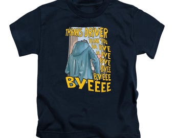 May include: Navy blue t-shirt with a graphic of a person in a blue coat, with the words "THANKS DRIVER" and "BYEEEEE" in yellow. The shirt features a cartoon-style illustration.
