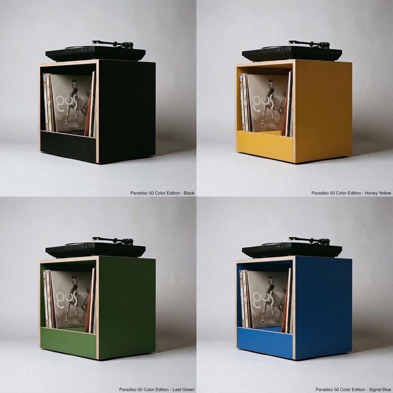 Paradiso 50 Color Edition modular plywood record player stand with natural plywood edges is shown in a four panel grid against a gray background with four color options. Each unit has a black turntable on top and upright vinyl storage below. The colorways are labeled Black, Honey Yellow, Leaf Green, and Signal Blue.