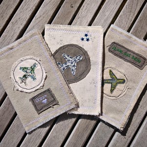 Handmade fabric passport holder. Free-motion quilted travel pouch. Original travel gift. Fabric passport holder handmade in France.