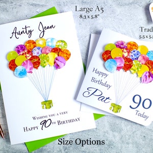 May include: Two birthday cards with colorful balloon designs. The larger card is 8.3 inches by 5.8 inches and says "Aunty Jean" and "Happy 90th Birthday". The smaller card is 5.5 inches by 5.5 inches and says "Happy Birthday Pat" and "90 Today".