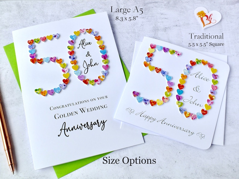 May include: Two white greeting cards with the number 50 made of colourful hearts. The cards are for a golden wedding anniversary and are personalised with the names Alice and John. The larger card is 8.3 inches by 5.8 inches and the smaller card is 5.5 inches by 5.5 inches.