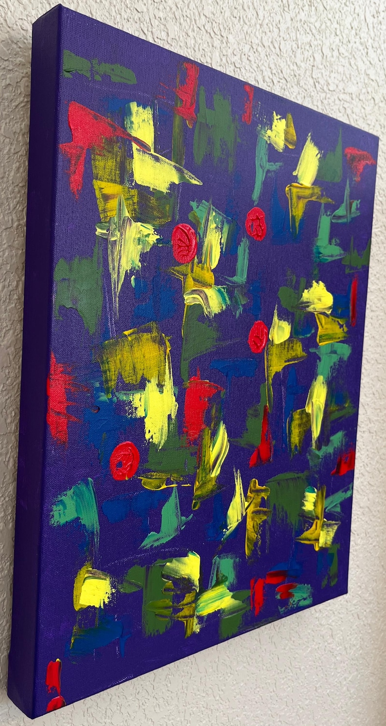 May include: A square canvas painting featuring a deep purple background with abstract brushstrokes in bright yellow, forest green, and vibrant red. The composition includes several small, circular red textured elements scattered across the surface.