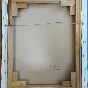 May include: The back of a rectangular canvas painting stretched over a light-colored wooden frame. The canvas is secured with metal staples along the edges. A thin metal hanging wire is attached to the top wooden bars. Handwritten text reads 2024 F0414.