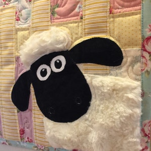Lamb in the Roses Baby Quilt Pattern by Ellen Abshier of Laugh Sew Quilt