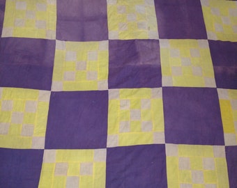 Double nine patch quilt top  84" x 65"  cotton, 12" square blocks of light mauve and yellow alt with solid purple blocks.  hand pieced 1940s