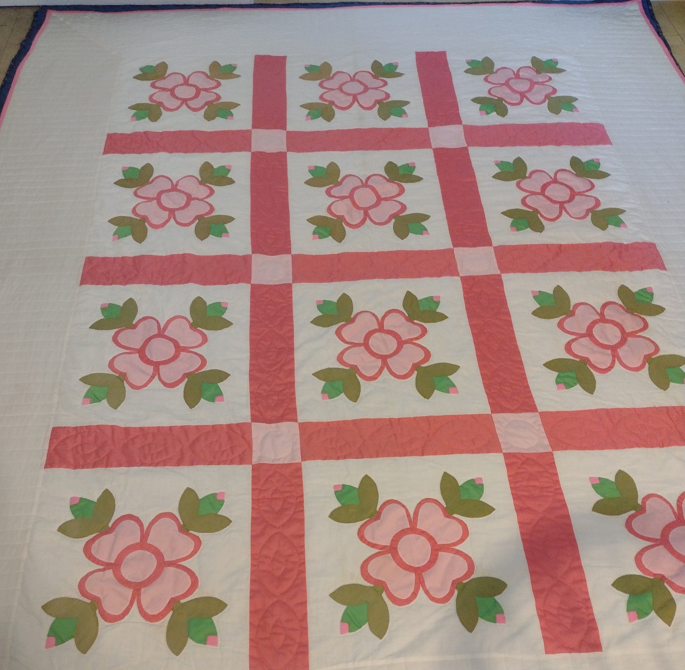 Dogwood blossoms quilt hand appliqued and quilted 78" x 92" 15.5" blocks, 12" w. borders 4" w. cable quilted sashing. Excellent work 1970s