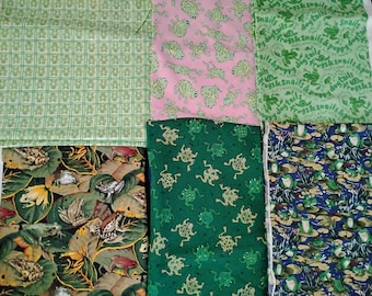 Six frog fabrics and uncut quilt pattern. lily pads frogs, framed frogs, frogs on green & pink backgrounds, poem frogs, camouflaged frogs