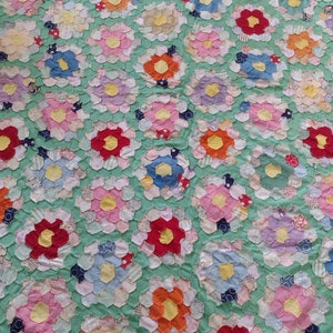 Scrap Grandmother's Flower Garden quilt top 72 x 90 Hand stitched 7.5 diameter 1.5 hexes scalloped lengths half gardens top bottom 1930s image 1