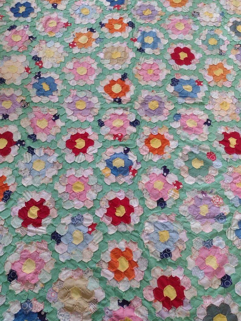 Scrap Grandmother's Flower Garden quilt top 72 x 90 Hand stitched 7.5 diameter 1.5 hexes scalloped lengths half gardens top bottom 1930s image 1