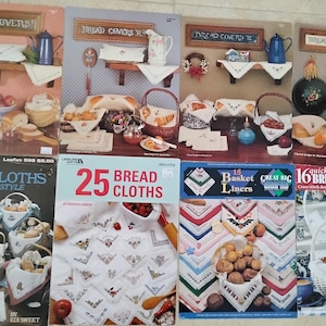 Eight counted cross stitch bread covers pattern leaflets