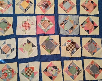 35 1940s cotton scraps quilt blocks: diamond in triangle diamond squares. Approx. 9" - 9.5"