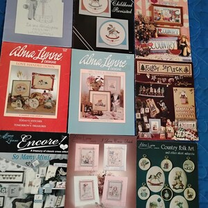 Nine Alma Lynne counted Cross stitch leaflets Wedding, Childhood, 2 Country, Love Handed Down, Me, Thee and Friends, Folk St Nick, Minis + 1