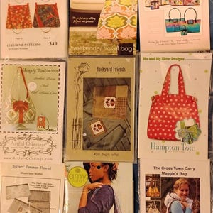 May include: Collection of purse and tote bag sewing patterns. Designs include a red polka dot tote, a floral weekender bag, and a bohemian tote. Patterns feature various styles and sizes for different sewing projects.