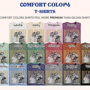Pu&ograve; includere: Una collezione di magliette Comfort Colors in vari colori, tra cui bianco, avorio e nero. Ogni maglietta presenta la scritta "BEST DAD EVER" e una foto di un padre e un figlio. Le magliette sono disposte in file.