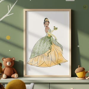 May include: A framed print featuring a princess in a green and yellow gown, holding a frog. The artwork has a whimsical style, with a light wood frame. The background is a green wall with white tree branch and yellow dot decorations. Decorative acorn mugs are on the shelf.