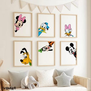 May include: A set of six rectangular wall art prints in light wood frames, each featuring a different Disney character peeking from the edge: Minnie Mouse, Donald Duck, Daisy Duck, Pluto, Goofy, and Mickey Mouse on a white background.