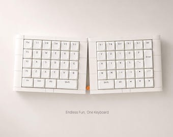 Kit de teclado mecánico dividido, teclado ergonómico ortolineal estilo ladrillo, ideal para armar o como regalo para un escritorio ya ensamblado.