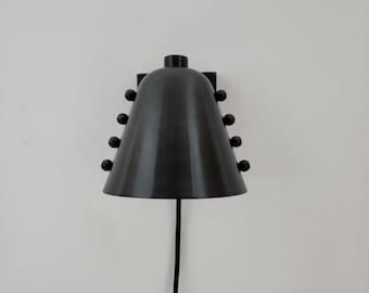 Mid-Century Brass Wall Sconce Bold Cone Design with Antique Black Shade and Rivet Accents