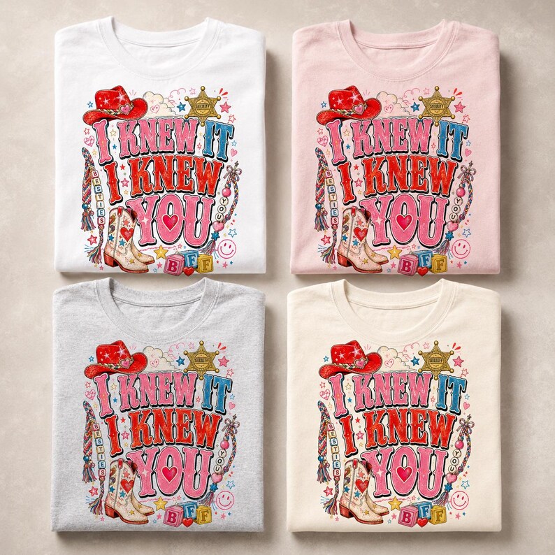 May include: Four t-shirts in white, light pink, heather gray, and cream, each featuring a graphic print with a red cowboy hat, a cowboy boot, a sheriff star, and the text I KNEW IT I KNEW YOU, alongside colorful hearts, stars, and beads.