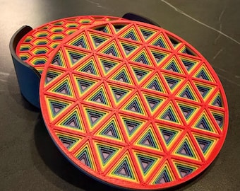 Sottobicchieri geometrici moderni, stampati in 3D, design 3D, colori arcobaleno Pride.