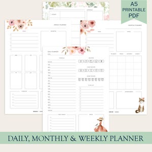 May include: A collection of printable A5 PDF planners, including daily, weekly, and monthly layouts. The pages feature floral accents in pink and green, with sections for schedules, goals, and notes. The text "DAILY, MONTHLY & WEEKLY PLANNER" is at the bottom.