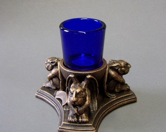 Lumen's Guard candleholder by Jay W. Hungate with miniature Chesters