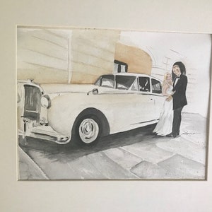 May include: Watercolour painting of a white vintage car with a couple in wedding attire. The car is parked on a cobbled street. The bride wears a white dress and the groom a black tuxedo.